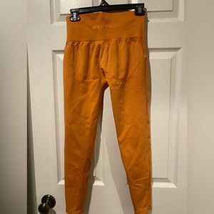 NVGTN orange seamless leggings